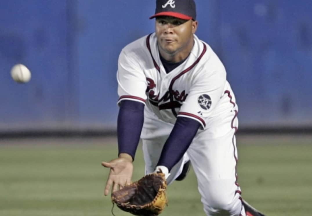 Andruw Jones showcasing his iconic center field skills during a game.